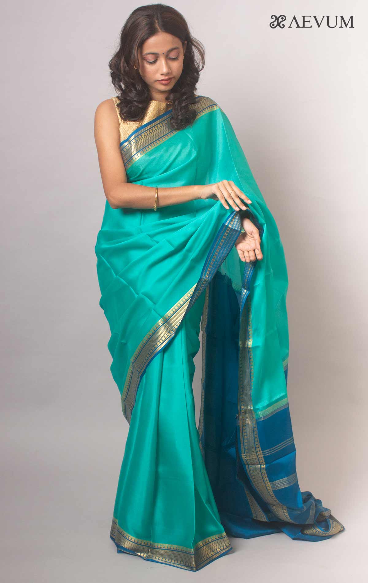 Dark green saree with red border - Sri Kumaran Stores